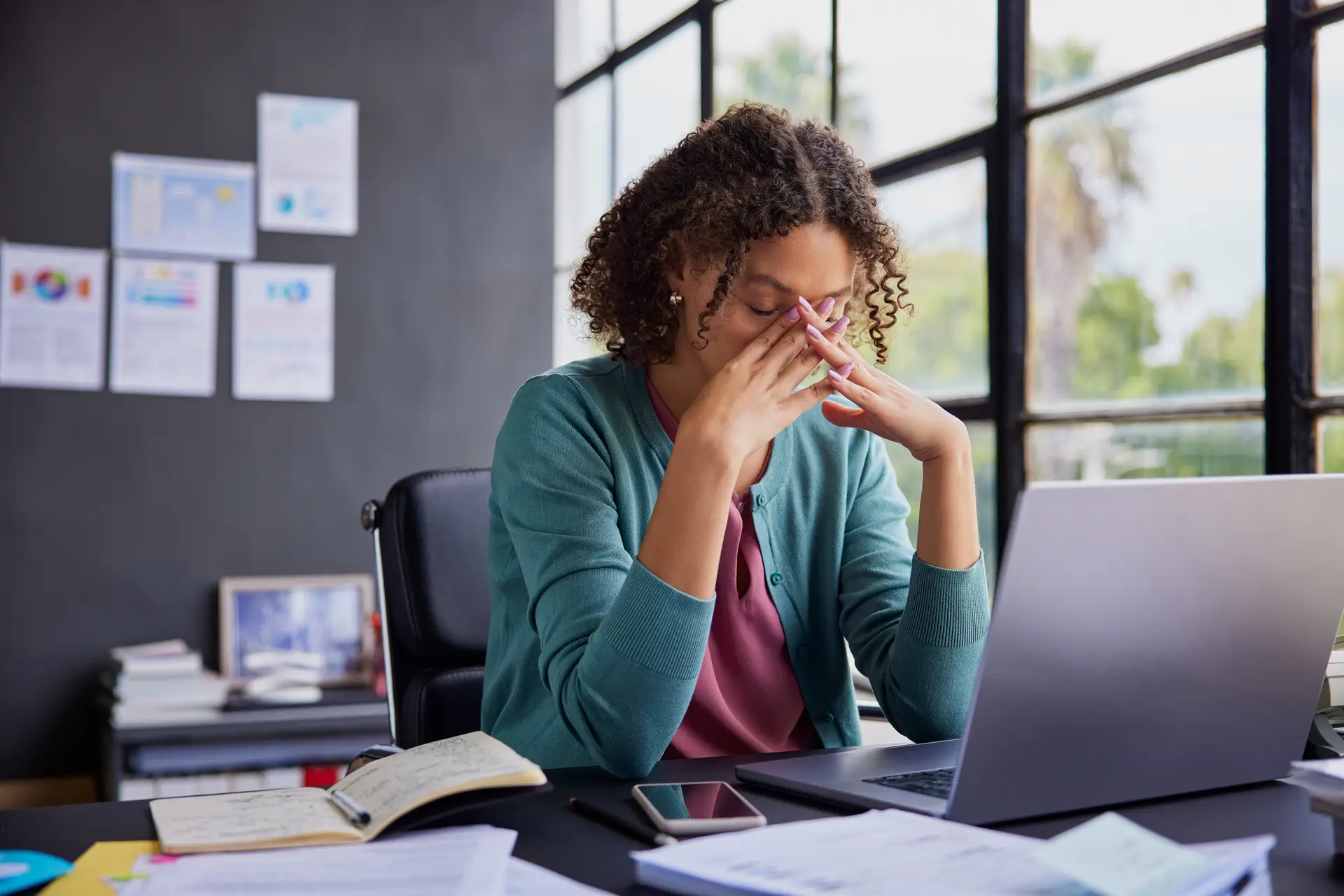 Stressed businesswoman at work